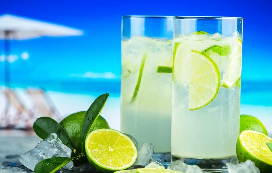 two summer drinks with lemon