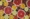 Assorted citrus fruit slices, including grapefruits, oranges, lemons, and blood oranges, arranged in a flat lay pattern on a dark background, showcasing natural Vitamin C benefits often found in Liposomal Vitamin C supplements.