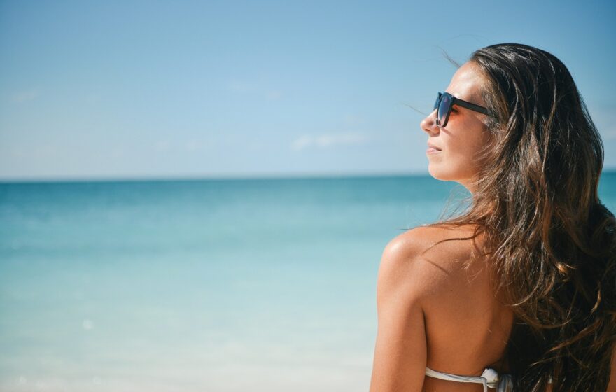 woman in bikini on a beach summer holiday