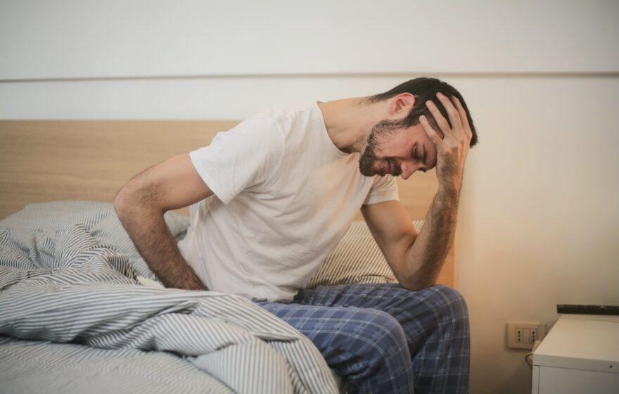 Man suffering from fatigue in the morning