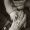baby holding elder's hand